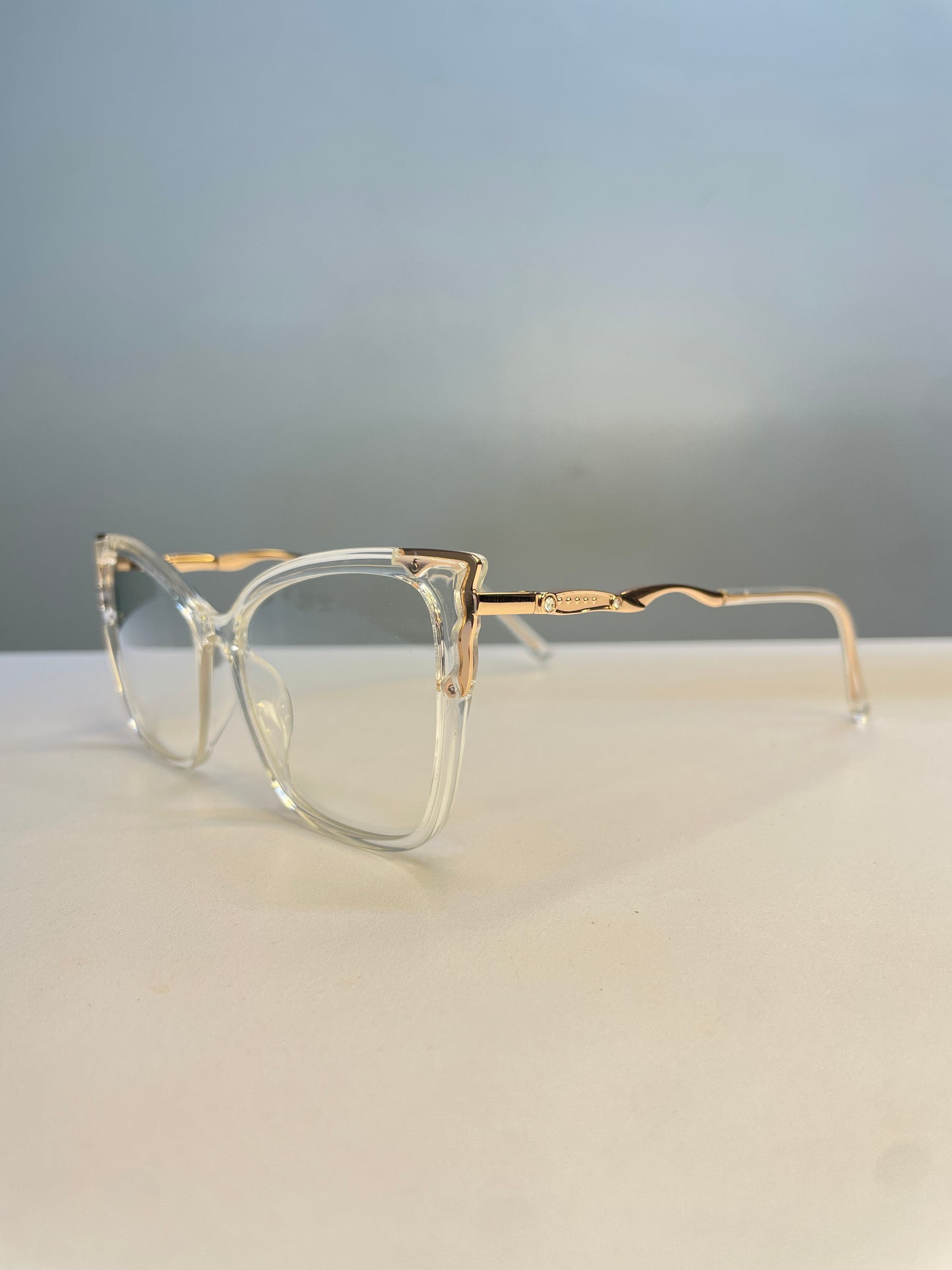 Mara collection, transparent with rose gold arms