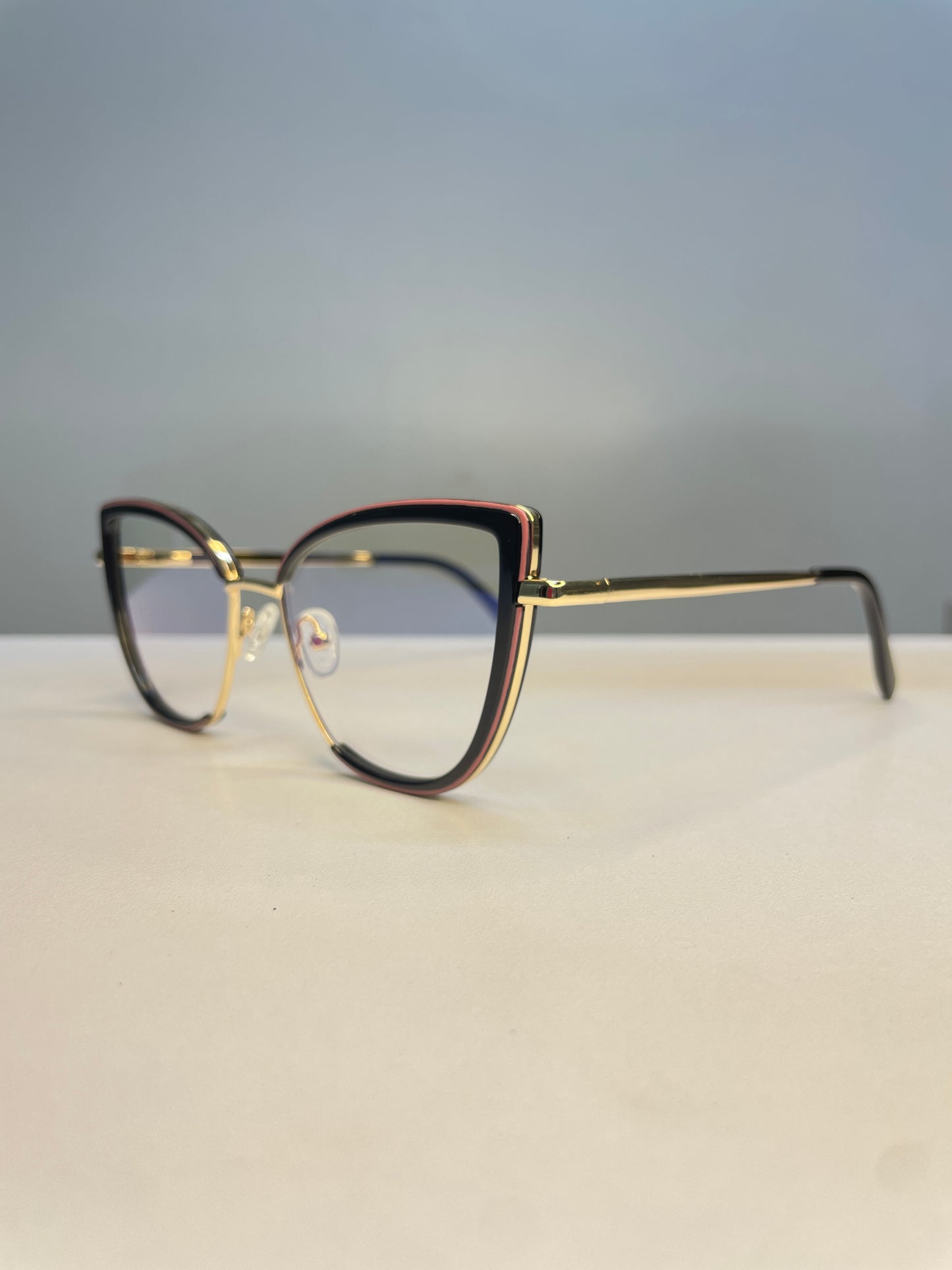 Reny collection, sleek black with a smooth pink rim