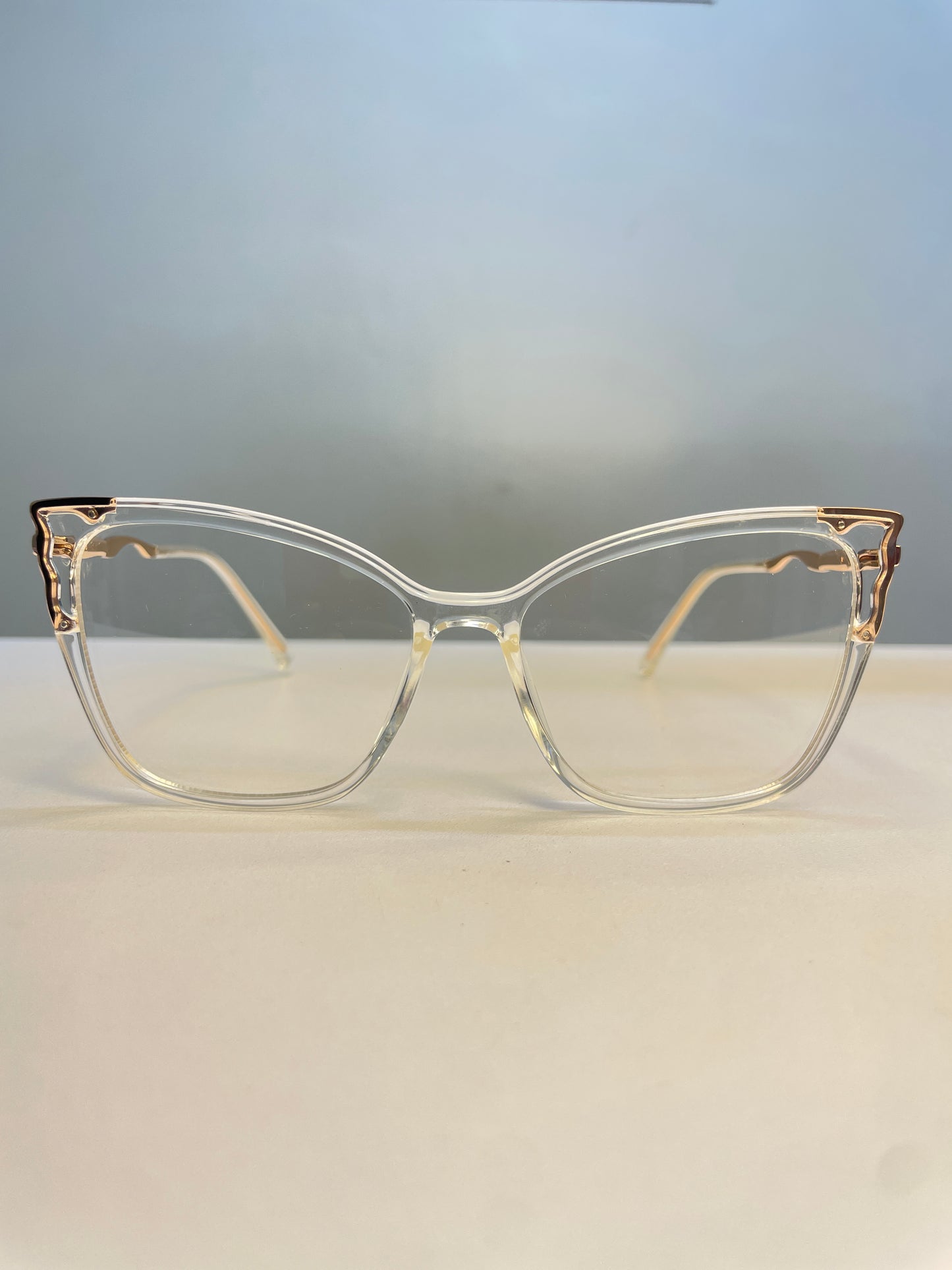 Mara collection, transparent with rose gold arms